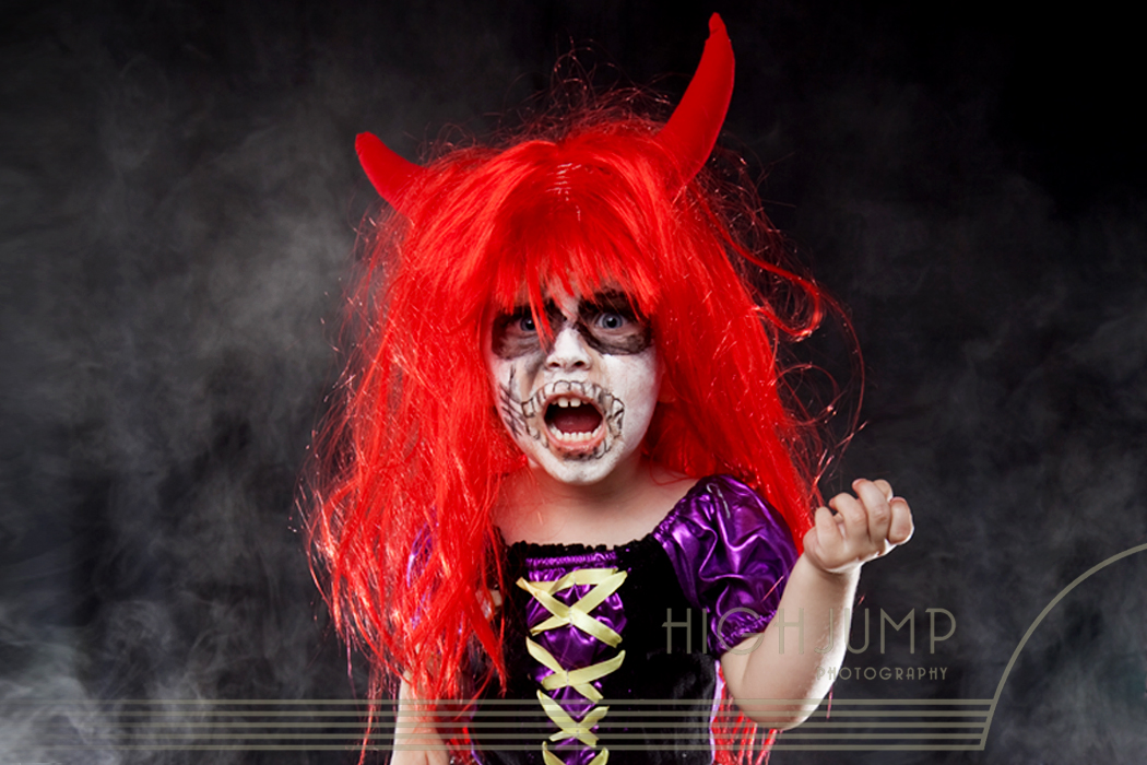 Three year old Lily shows us her scary side during the Halloween mini photo shoots on Headland Drive.